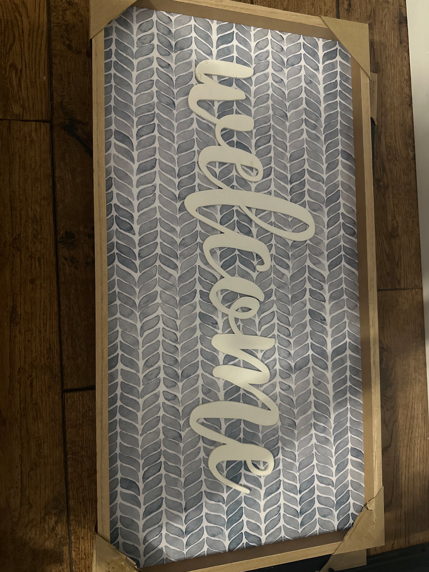 Blue welcome sign