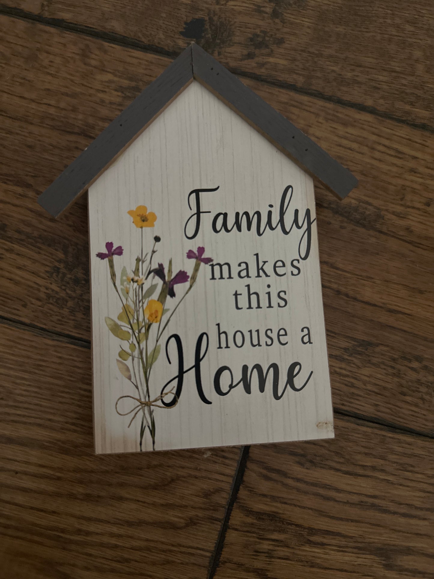 Family makes this a house a home small wooden sign