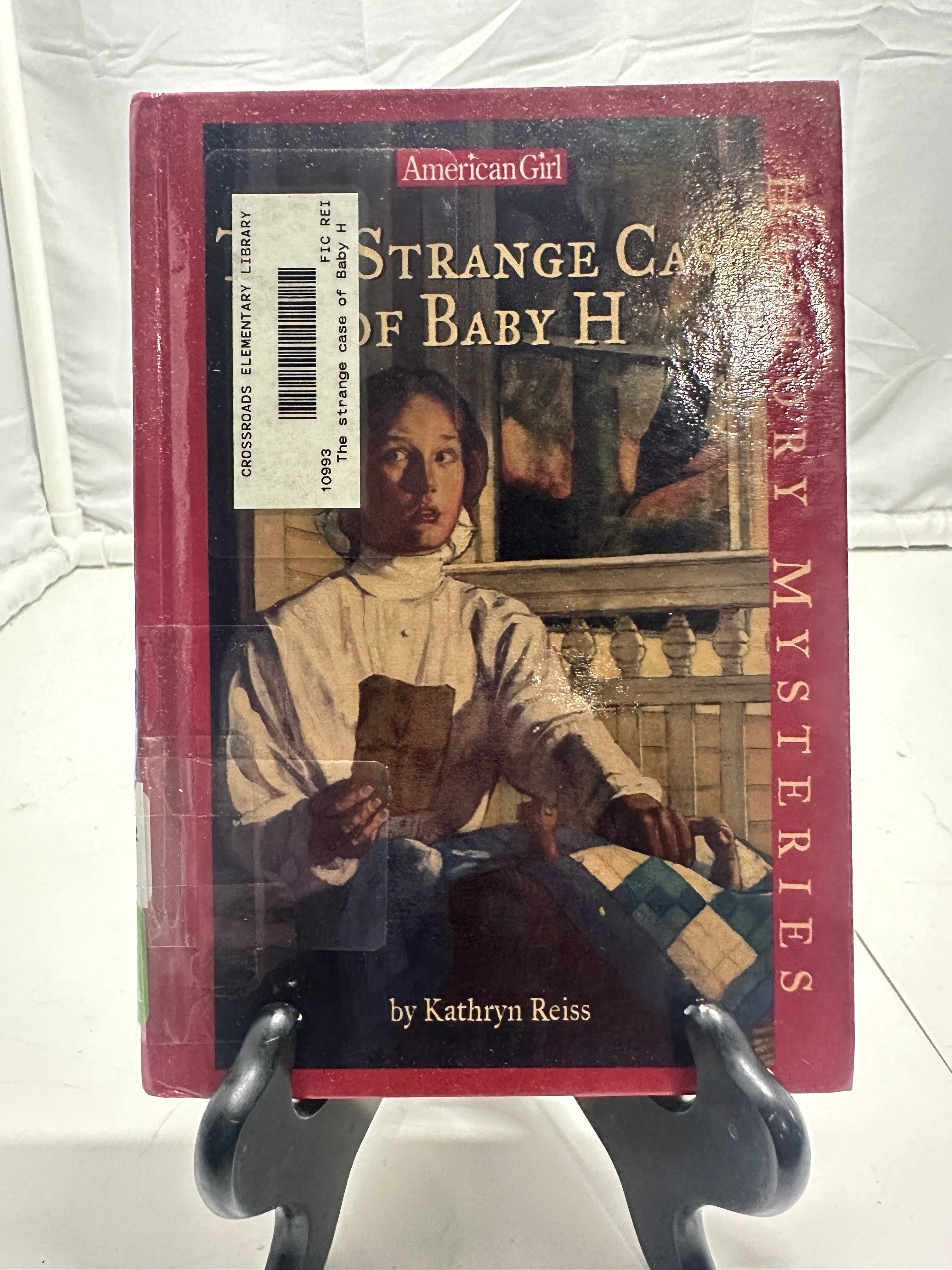The Strange Case of Baby H by Kathryn Reiss Hardcover Children