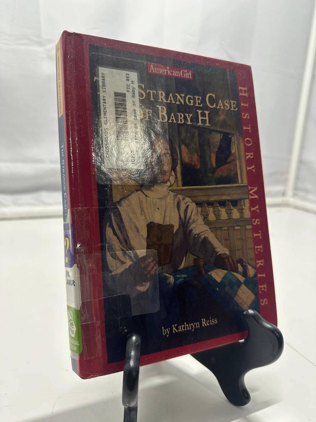 The Strange Case of Baby H by Kathryn Reiss Hardcover Children