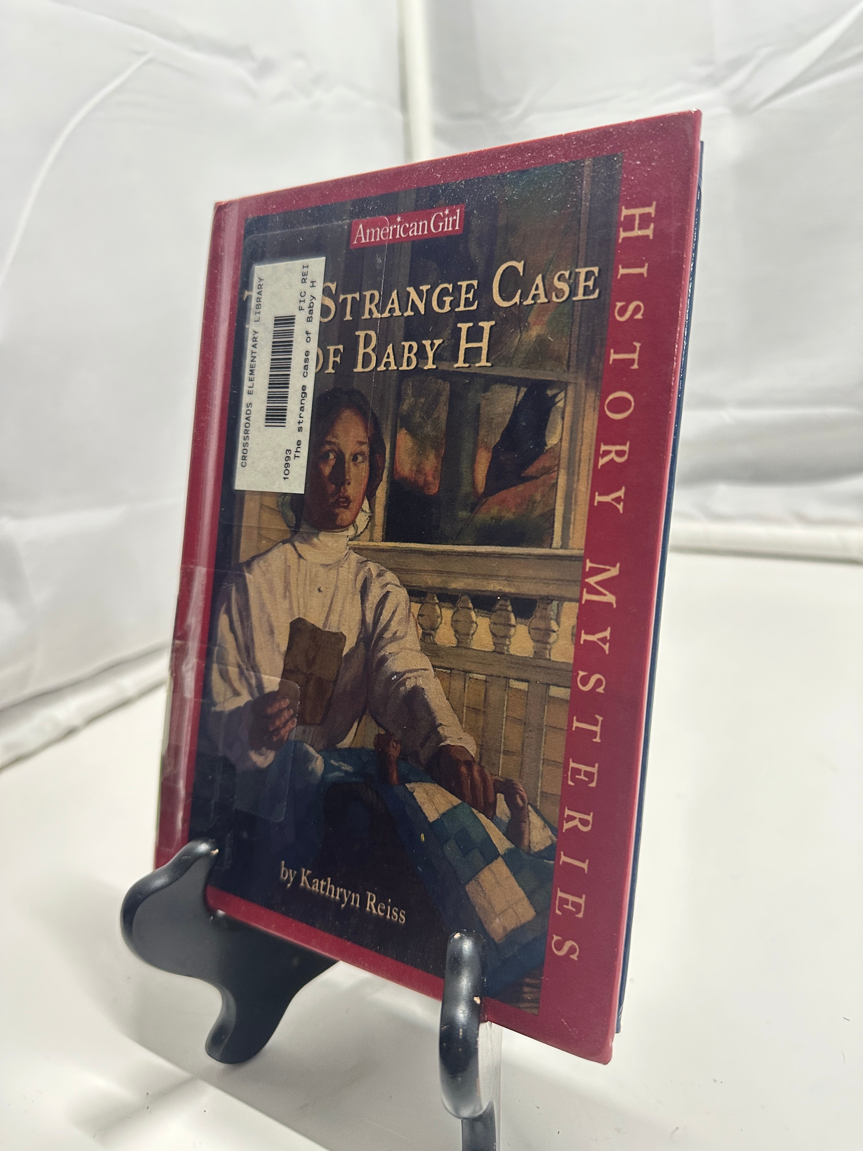 The Strange Case of Baby H by Kathryn Reiss Hardcover Children