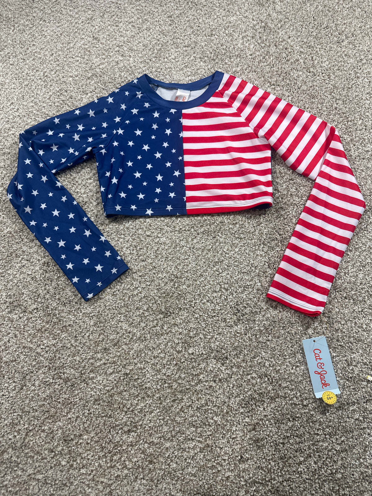 Cat & Jack stars and stripes long sleeve rash guard size L (10/12)