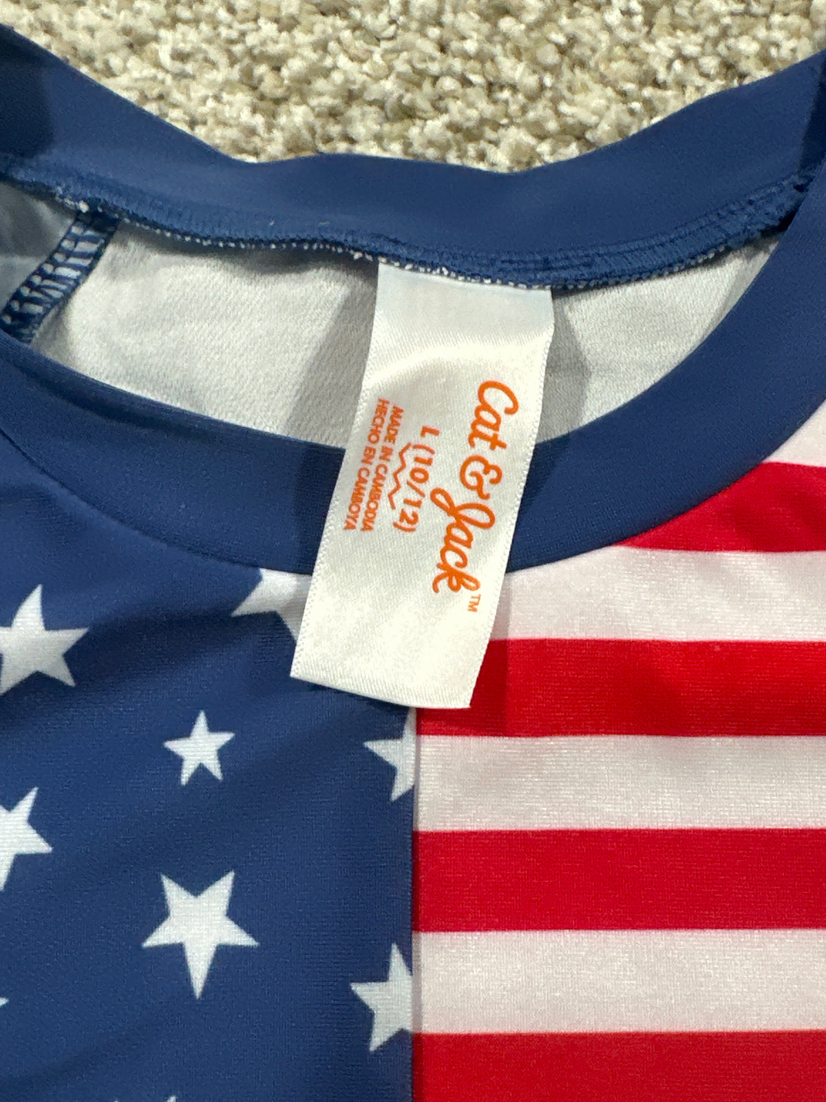 Cat & Jack stars and stripes long sleeve rash guard size L (10/12)