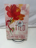 Tied – Carian Cole