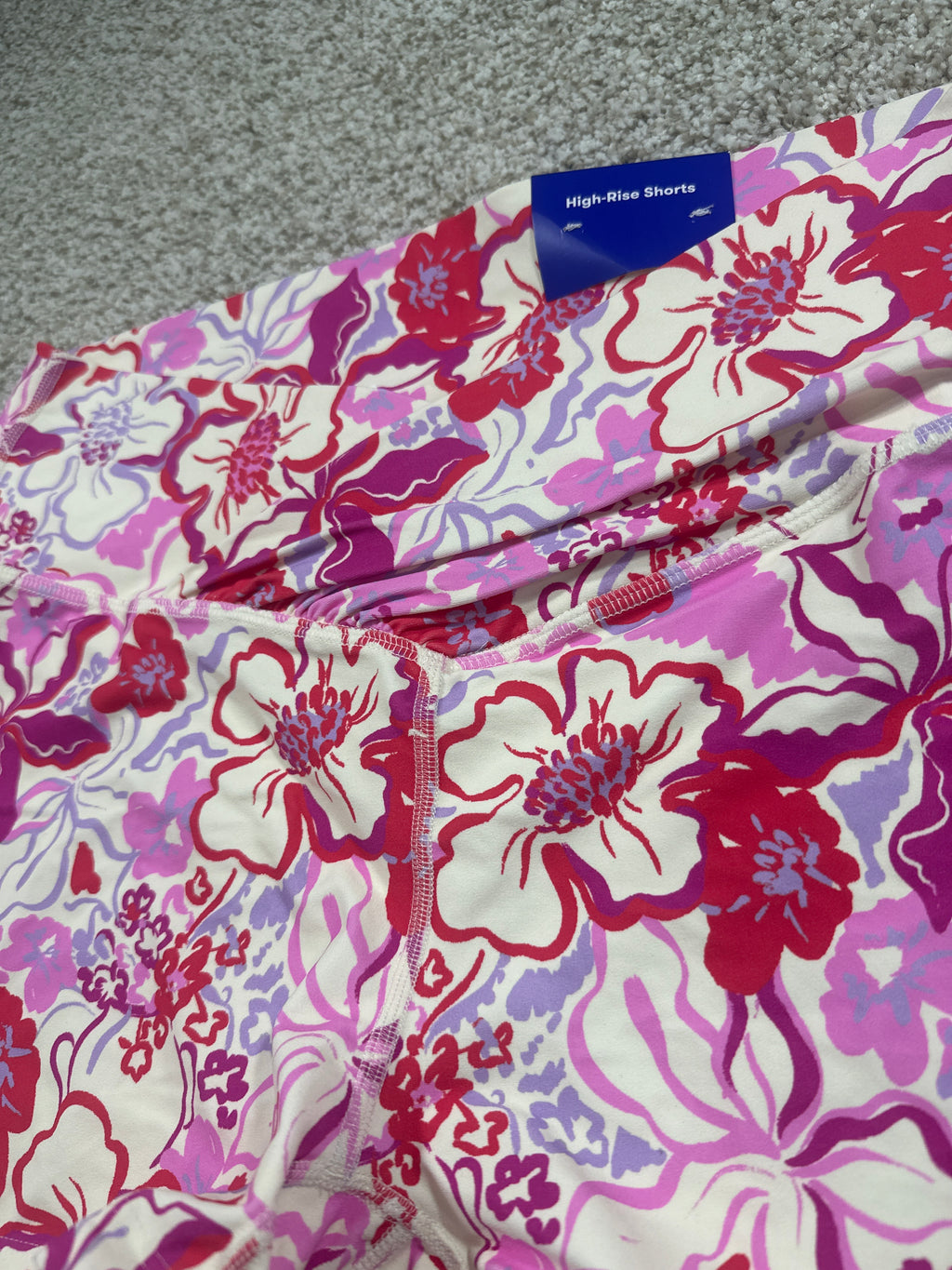 JoyLab tropical floral high-rise bike shorts waistband detail