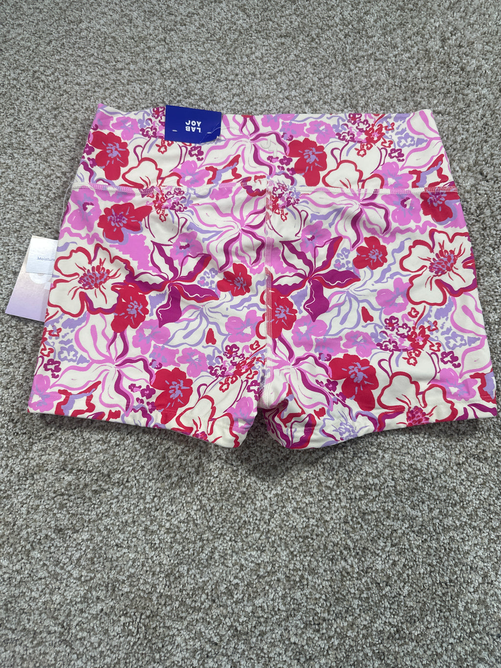 JoyLab floral high-rise bike shorts interior construction detail