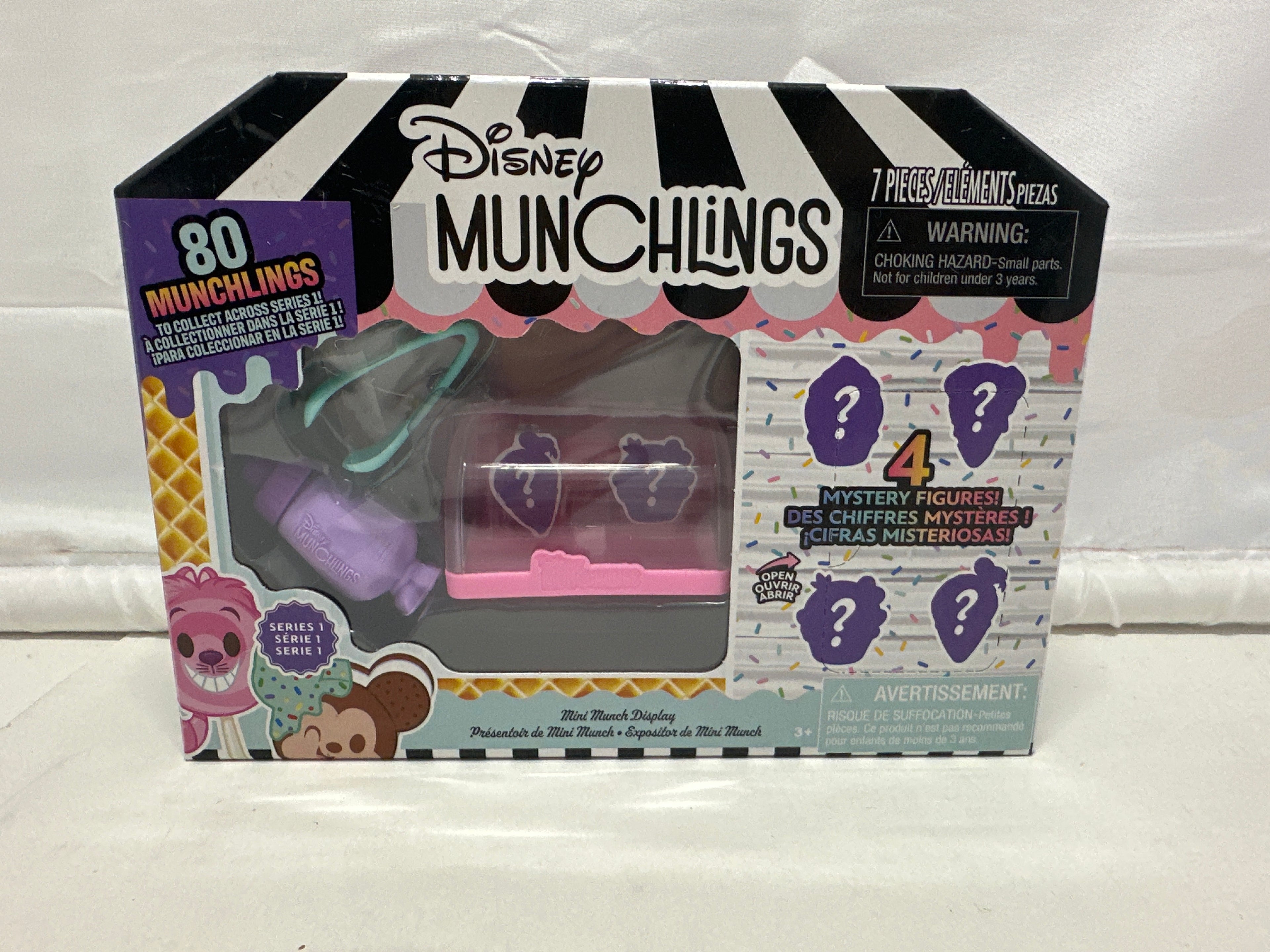 Disney Munchlings Mini Munch Display 7-Piece Set with 4 Mystery Figures Pink