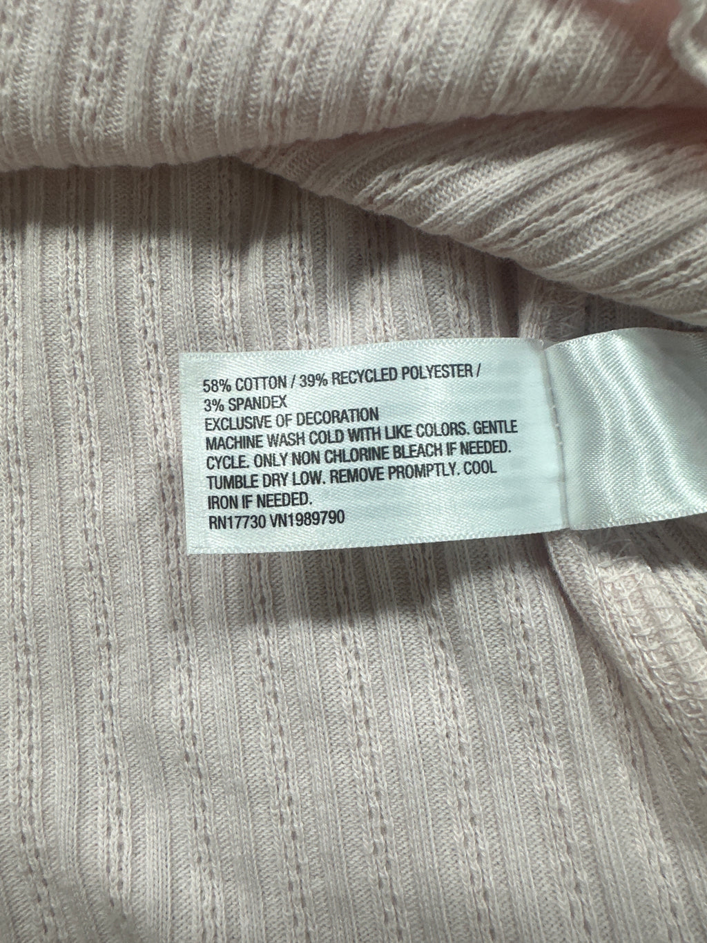 Universal Thread women's pink pointelle henley shirt fabric content tag