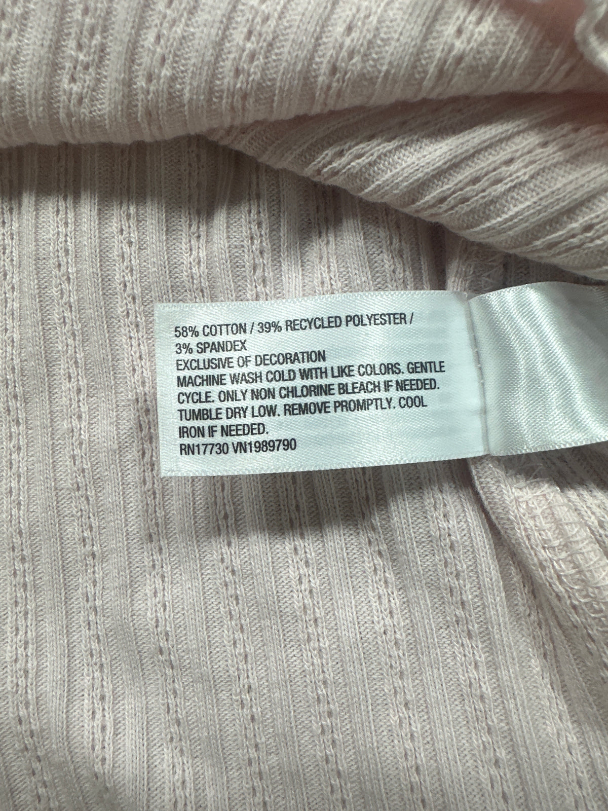 Universal Thread women's pink pointelle henley shirt fabric content tag