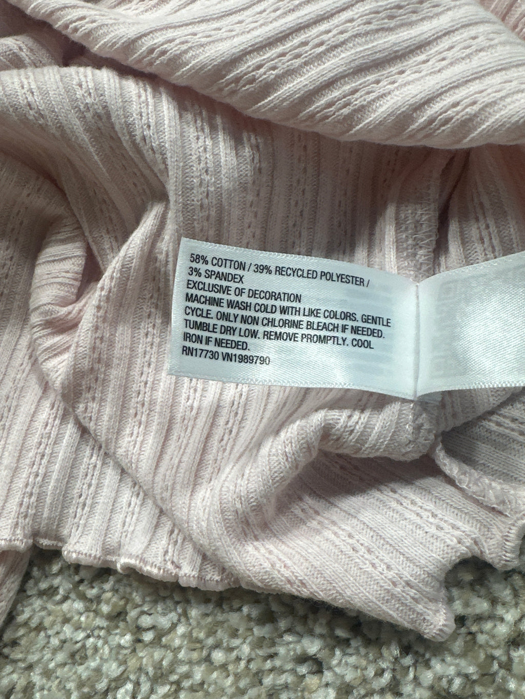 Universal Thread women's pink pointelle henley shirt fabric content tag