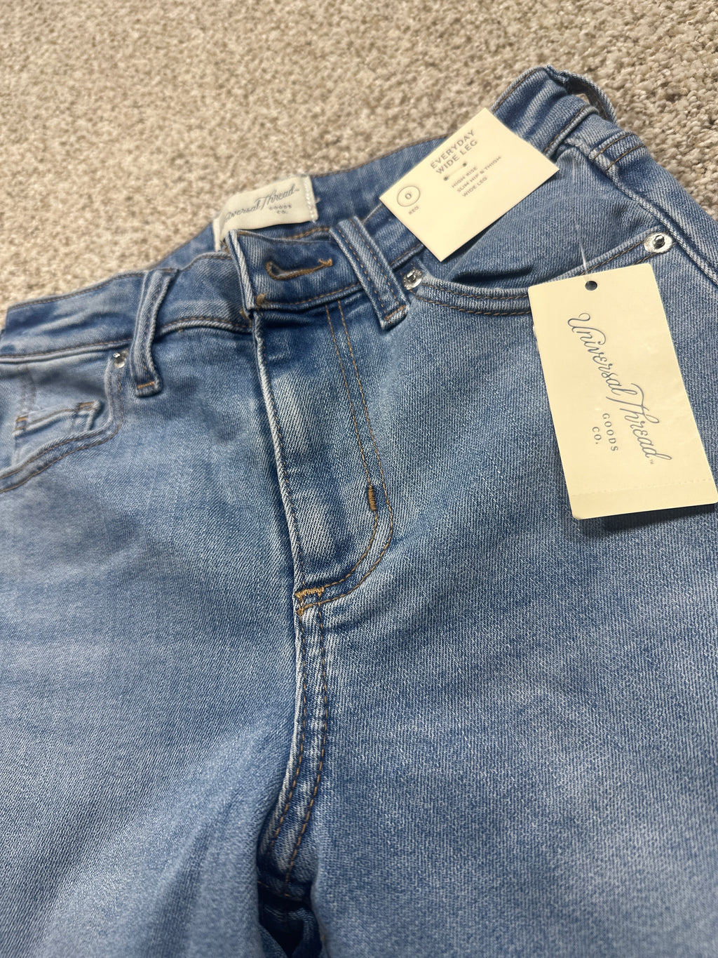 Universal Thread size 0 regular high-rise wide-leg jeans tag and waistband