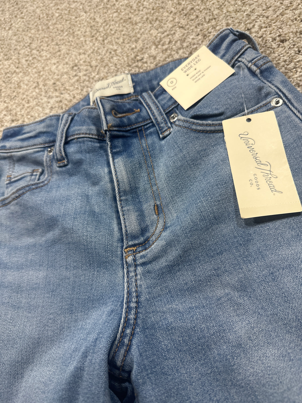 Universal Thread size 0 regular high-rise wide-leg jeans tag and waistband