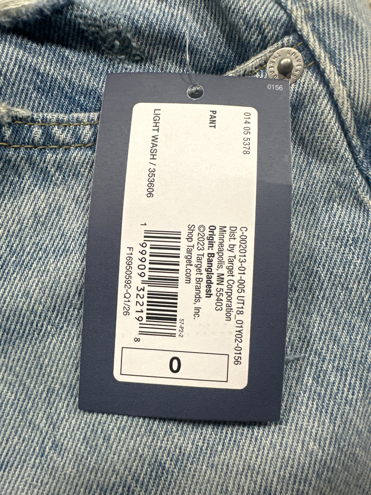 Universal Thread size 0 light wash jeans retail tag and barcode