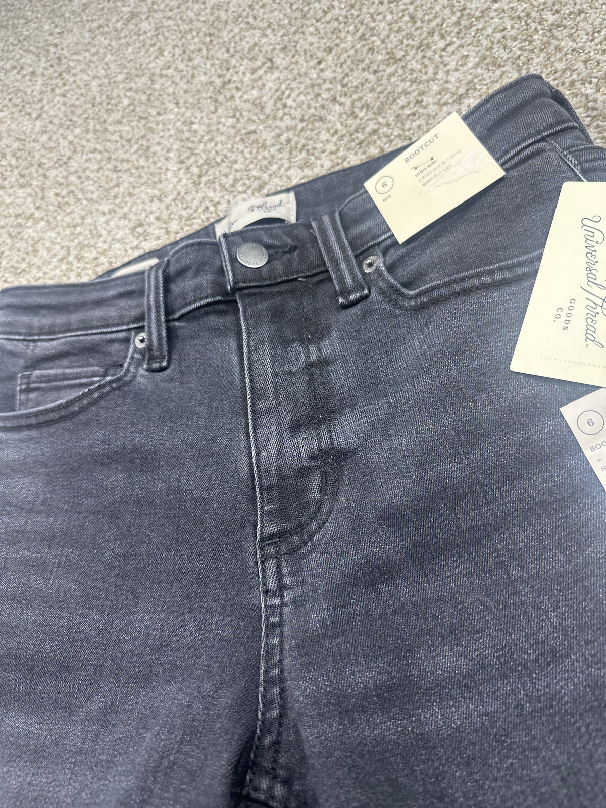 Universal Thread size 6 regular black high-rise bootcut jeans waistband and retail tag