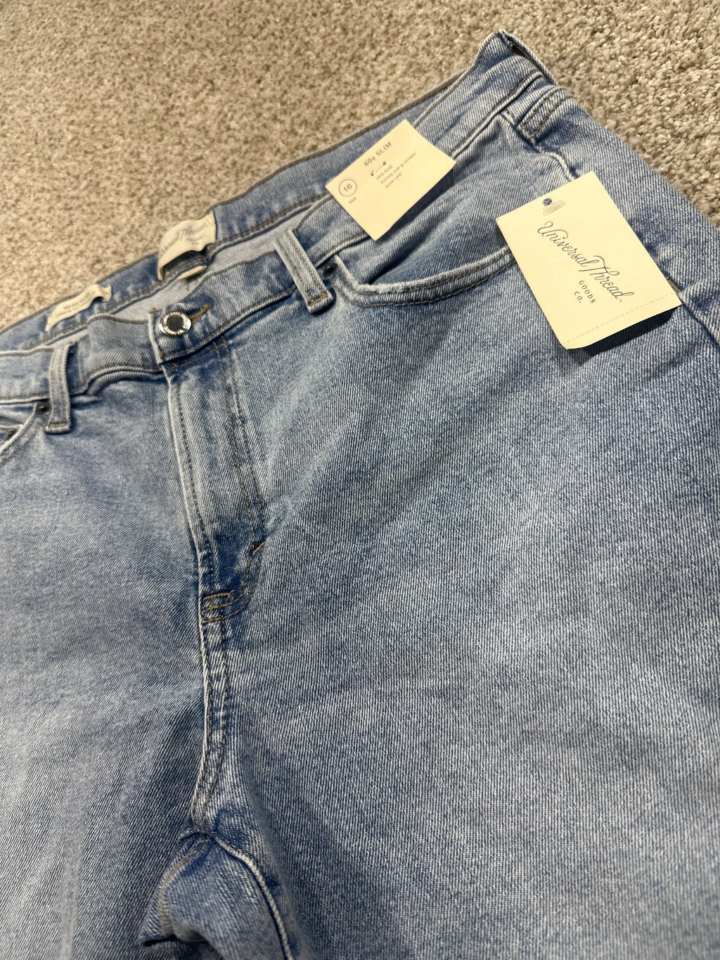 Universal Thread size 16 regular medium wash 90s slim jeans waistband and retail tag