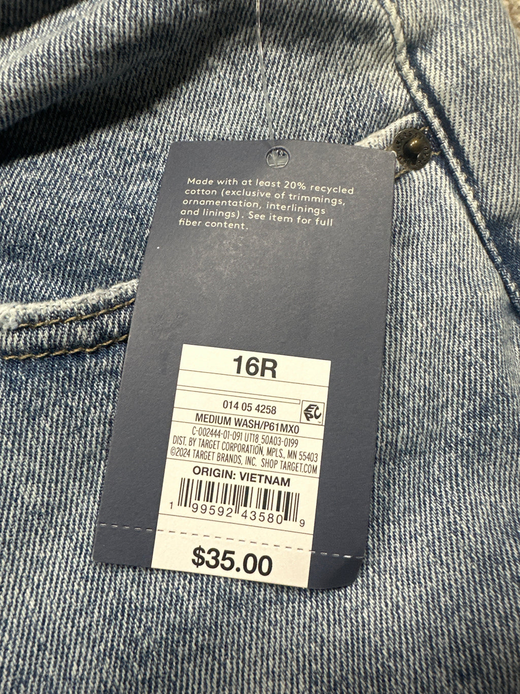 Universal Thread size 16 regular medium wash jeans retail tag and barcode