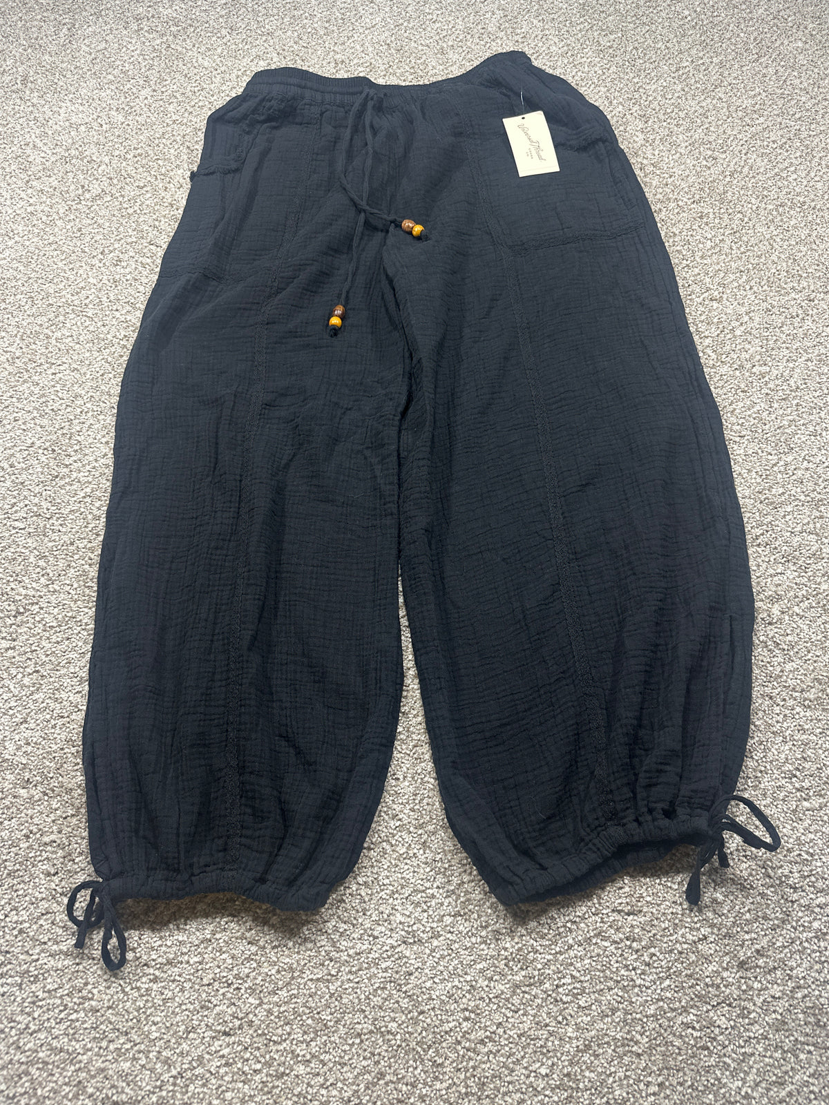 Universal Thread women’s black cotton gauze drawstring pants front view