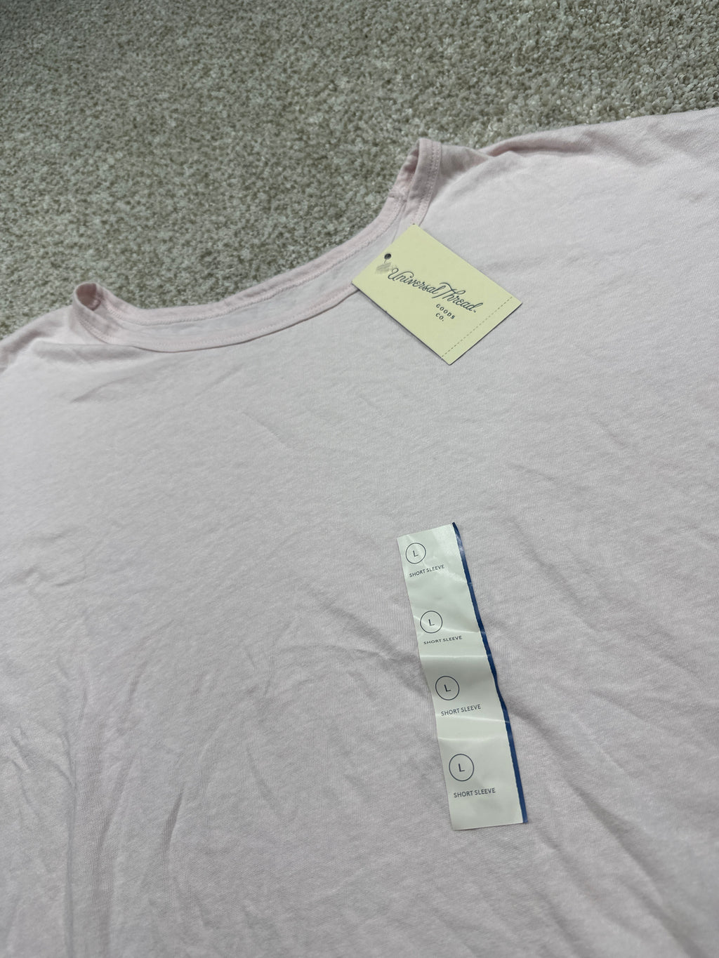Universal Thread light pink T-shirt neckline and size L detail