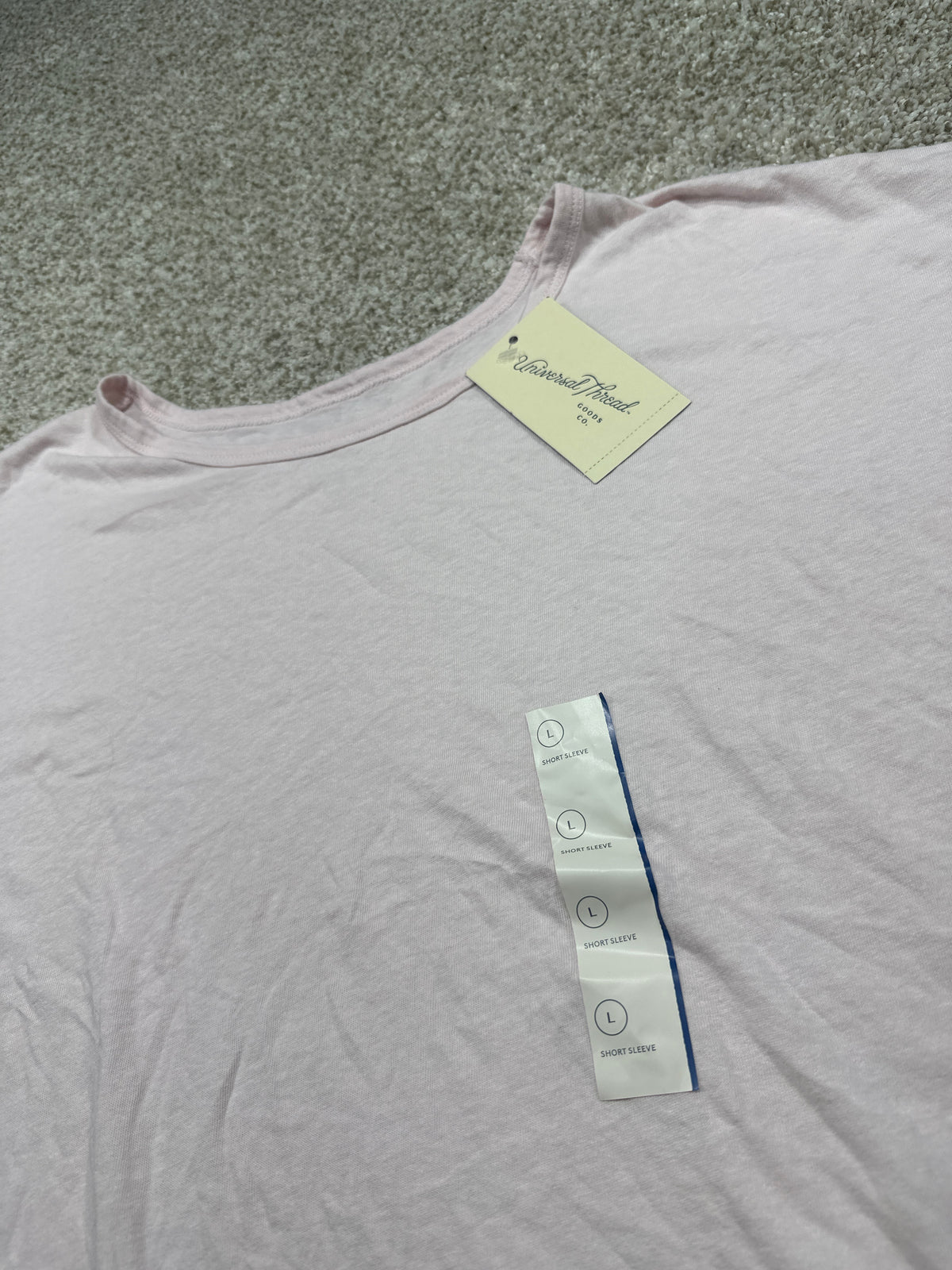 Universal Thread light pink T-shirt neckline and size L detail