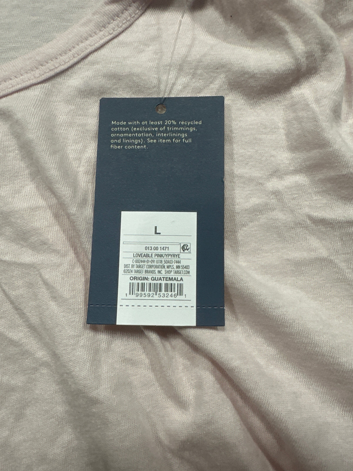 Universal Thread light pink T-shirt retail tag showing size L and UPC