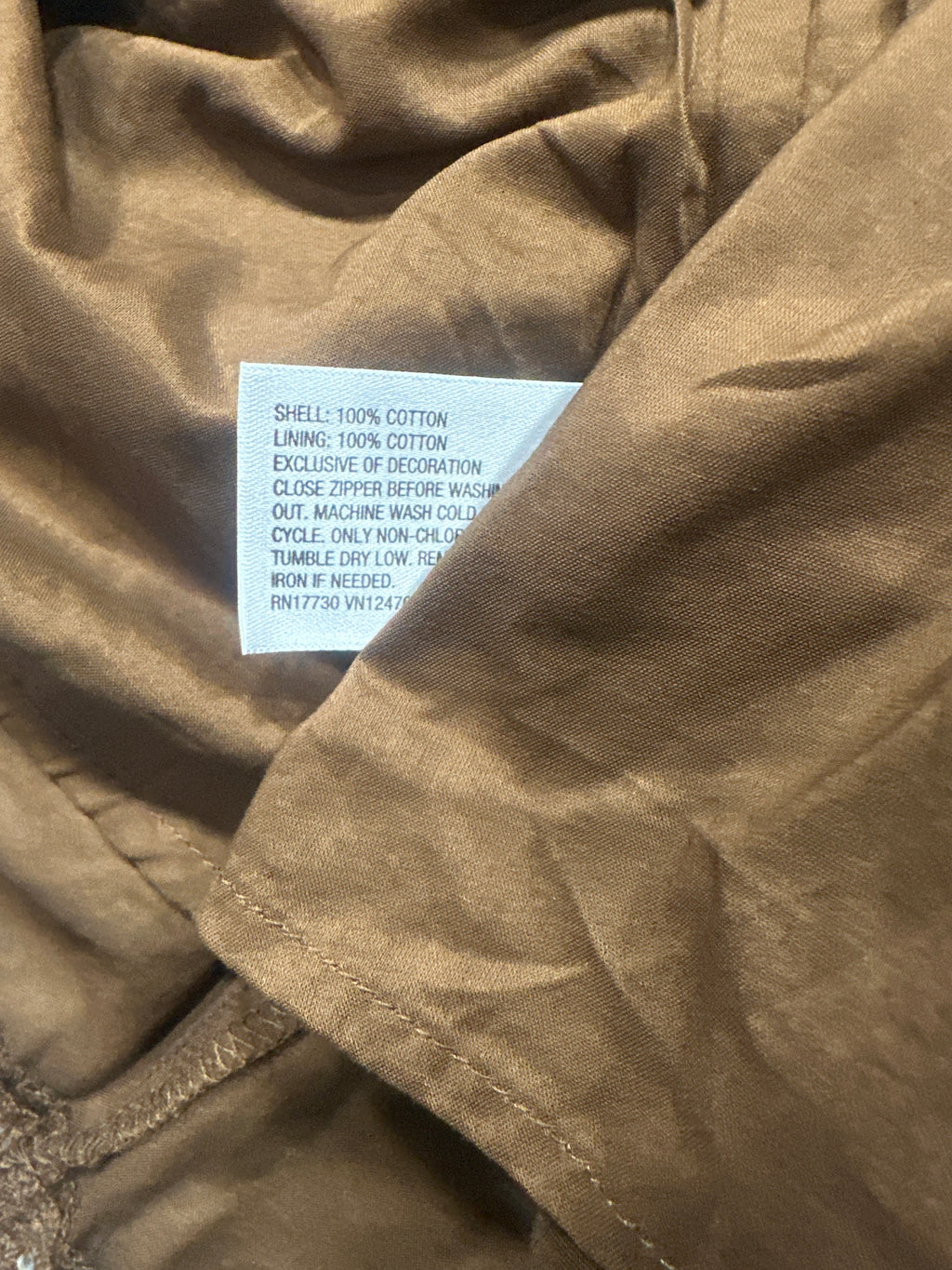 Universal Thread dress care label showing cotton shell and lining