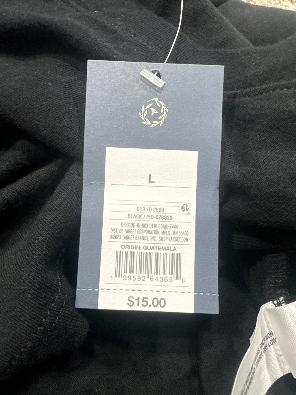 Universal Thread black T-shirt retail tag showing size L and UPC