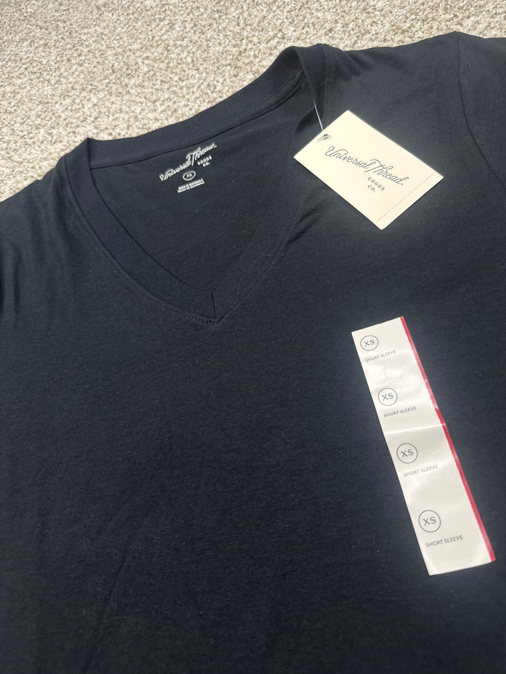 Universal Thread black V-neck short sleeve T-shirt brand and size XS detail