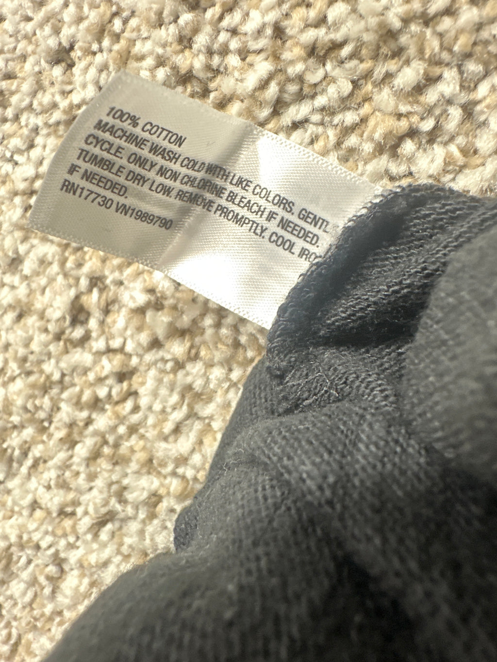 Universal Thread pants material label showing 100 percent cotton