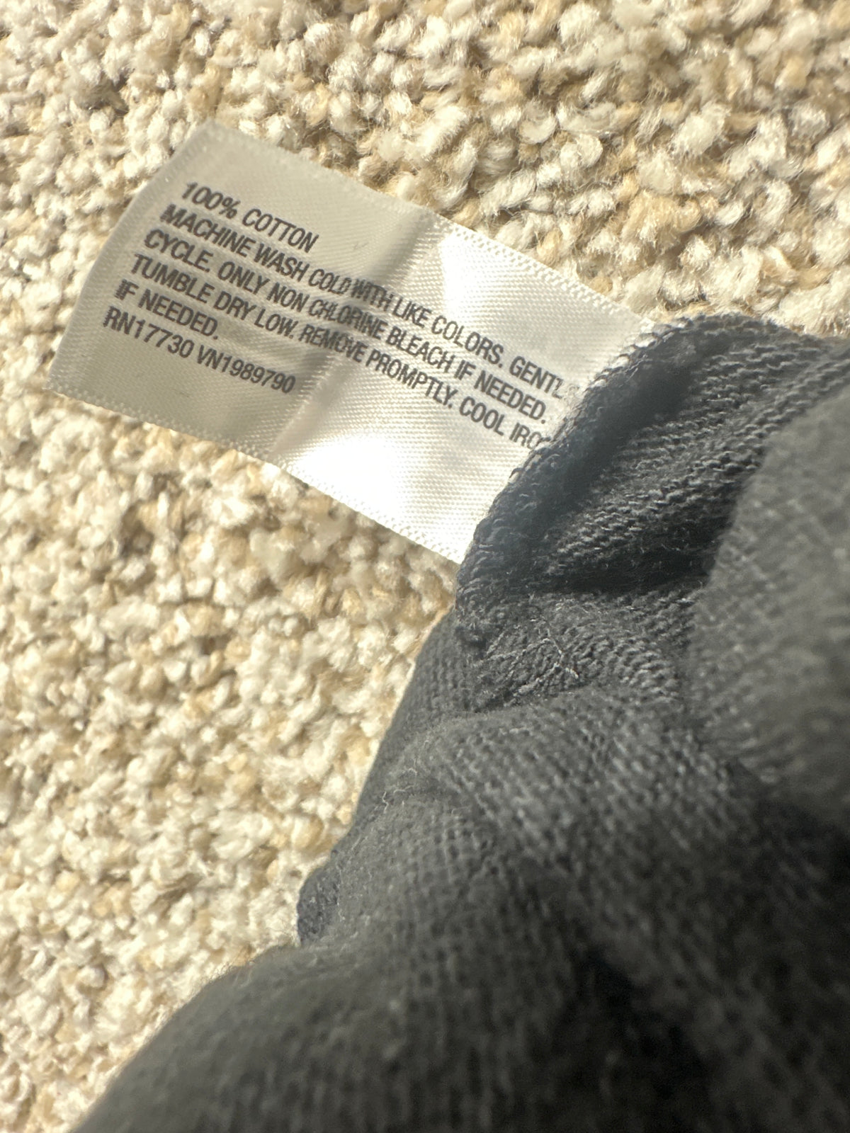 Universal Thread pants material label showing 100 percent cotton
