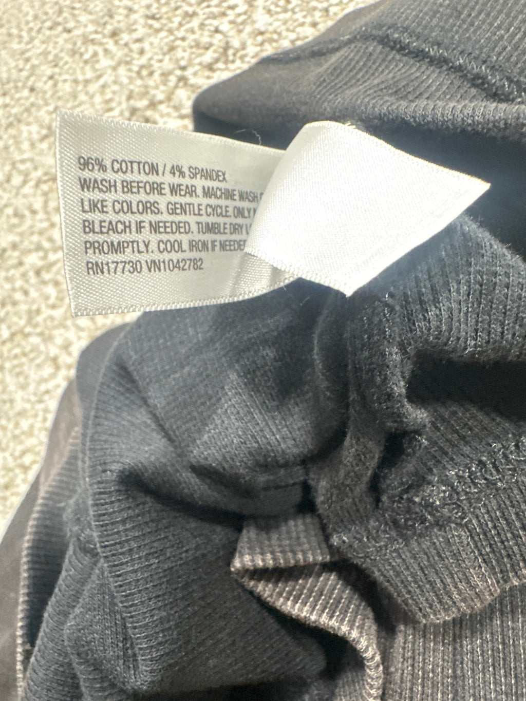 Universal Thread tank top material label showing cotton spandex blend