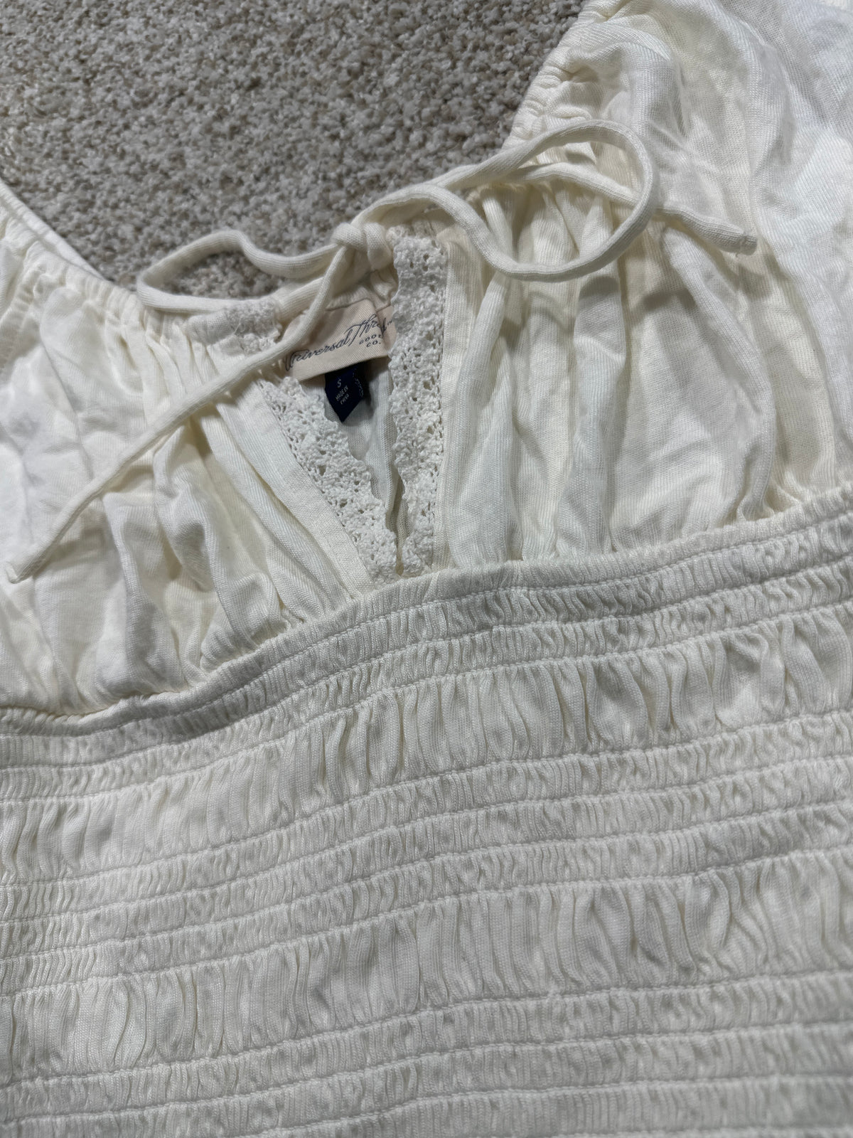 Universal Thread women's cream smocked puff sleeve top neckline