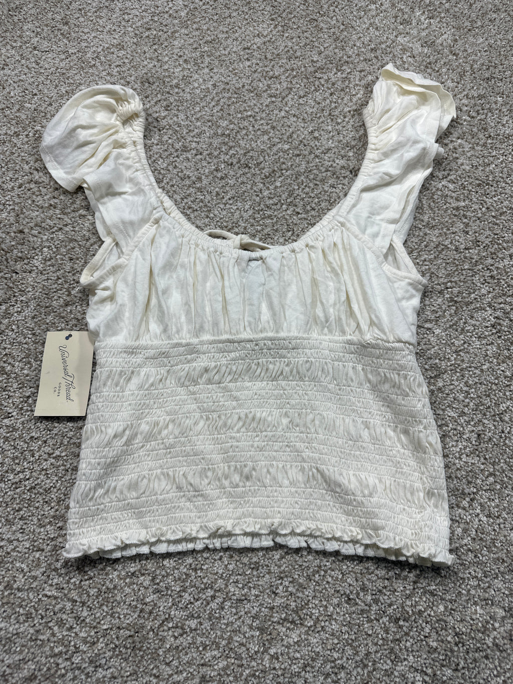 Universal Thread women's cream smocked puff sleeve top detail