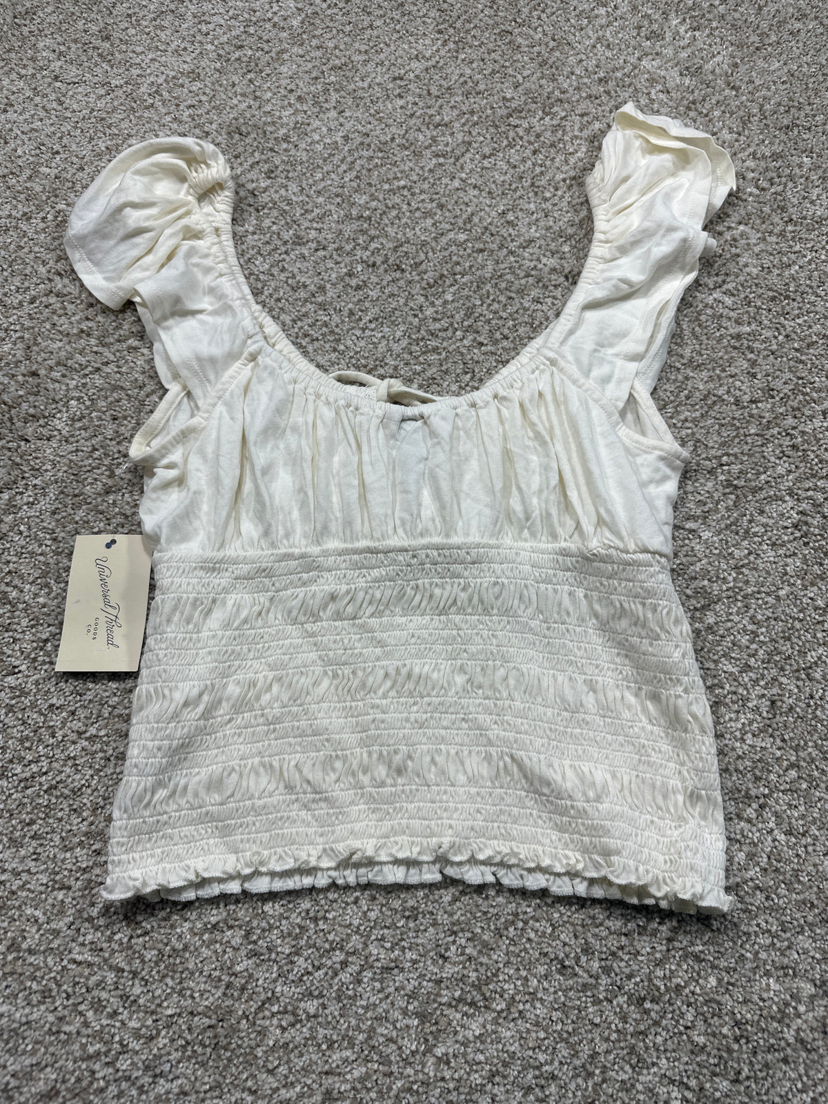 Universal Thread women's cream smocked puff sleeve top detail