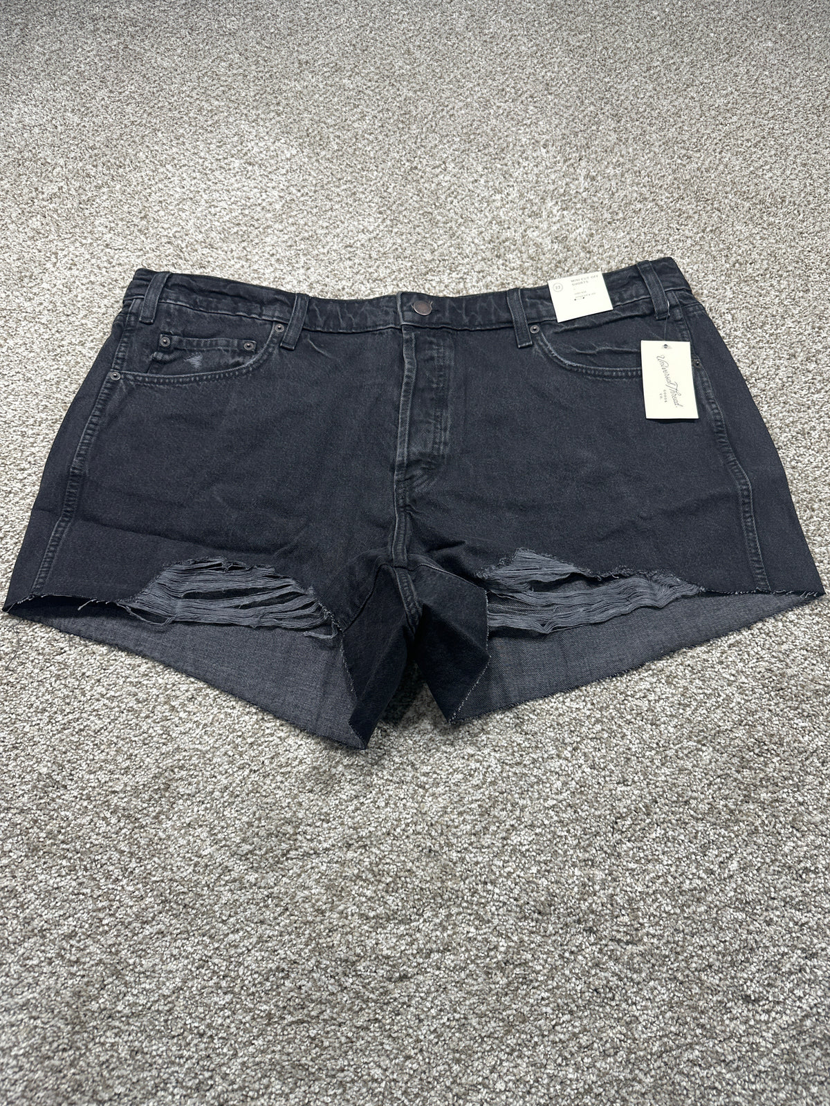 Universal Thread women's black distressed denim cutoff shorts front