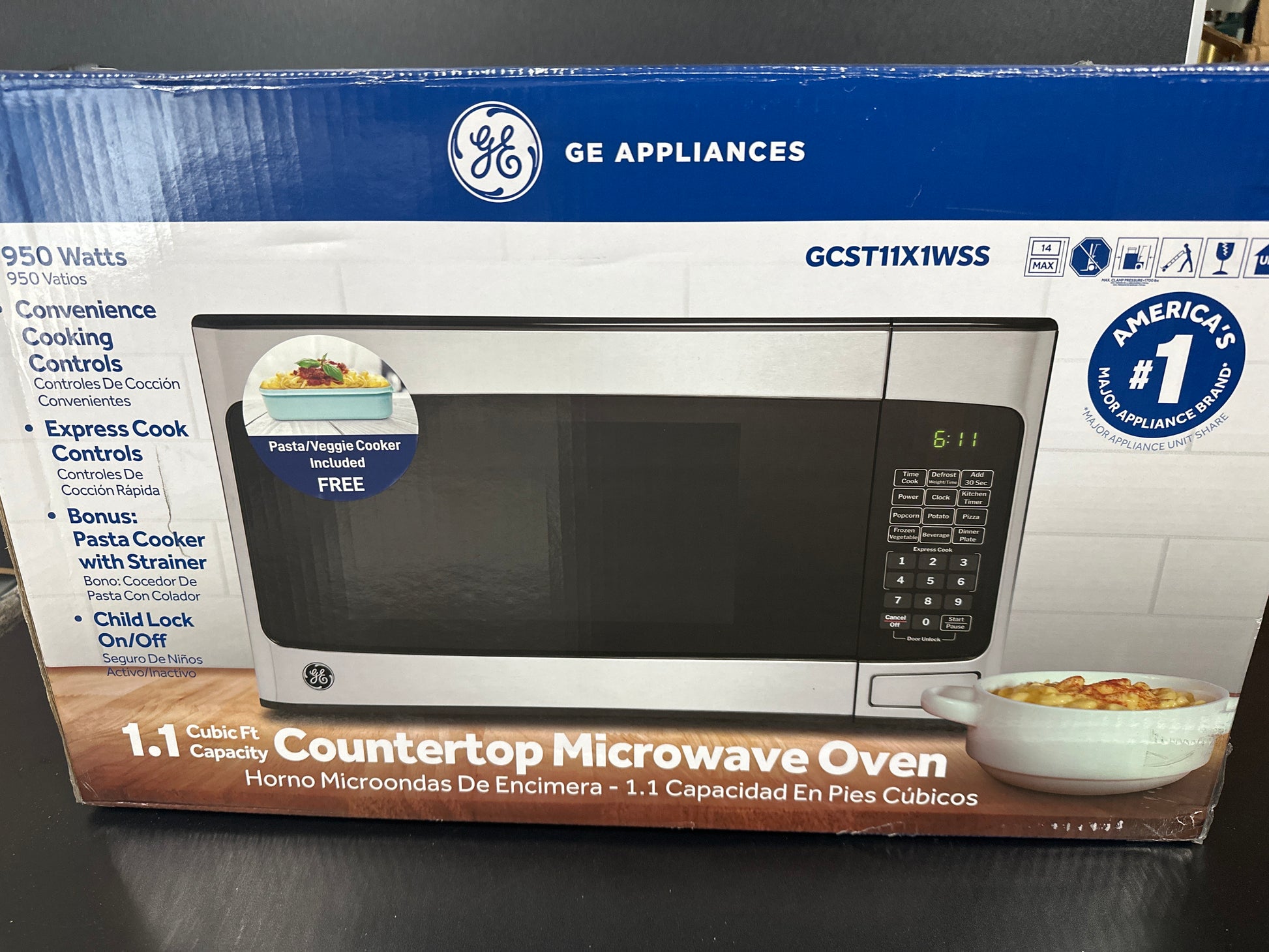 GE 1.1-cu ft Medium 950 -Watt Countertop Microwave ( Stainless Steel )