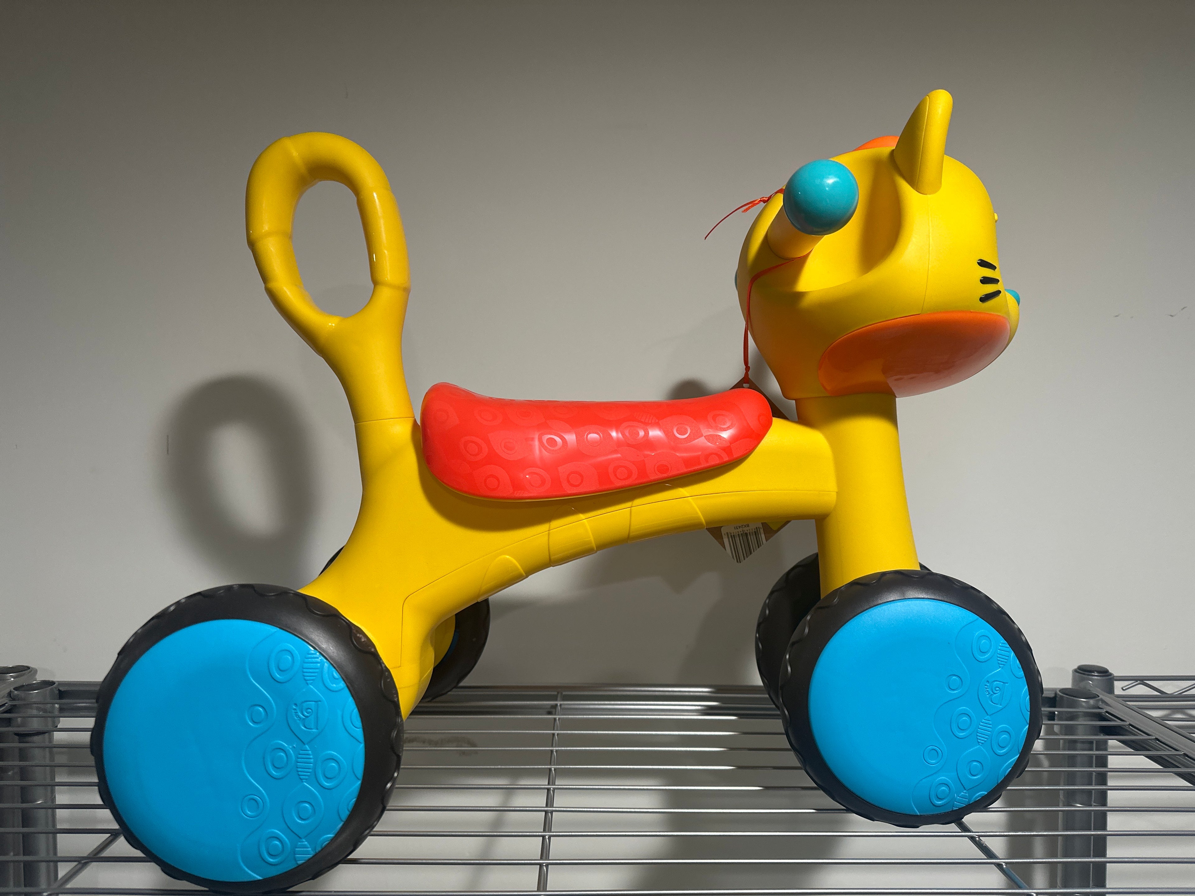 B. Toys Ride-On Toy – Riding Buddy Cat (Pedal Push)