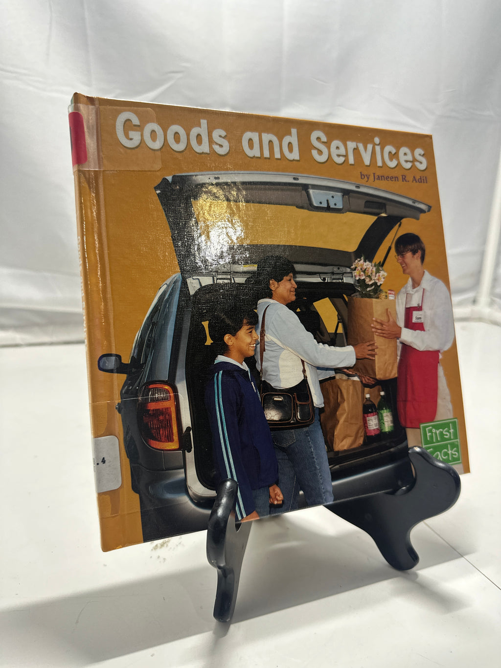 Goods and Services by Janeen R. Adil Hardcover