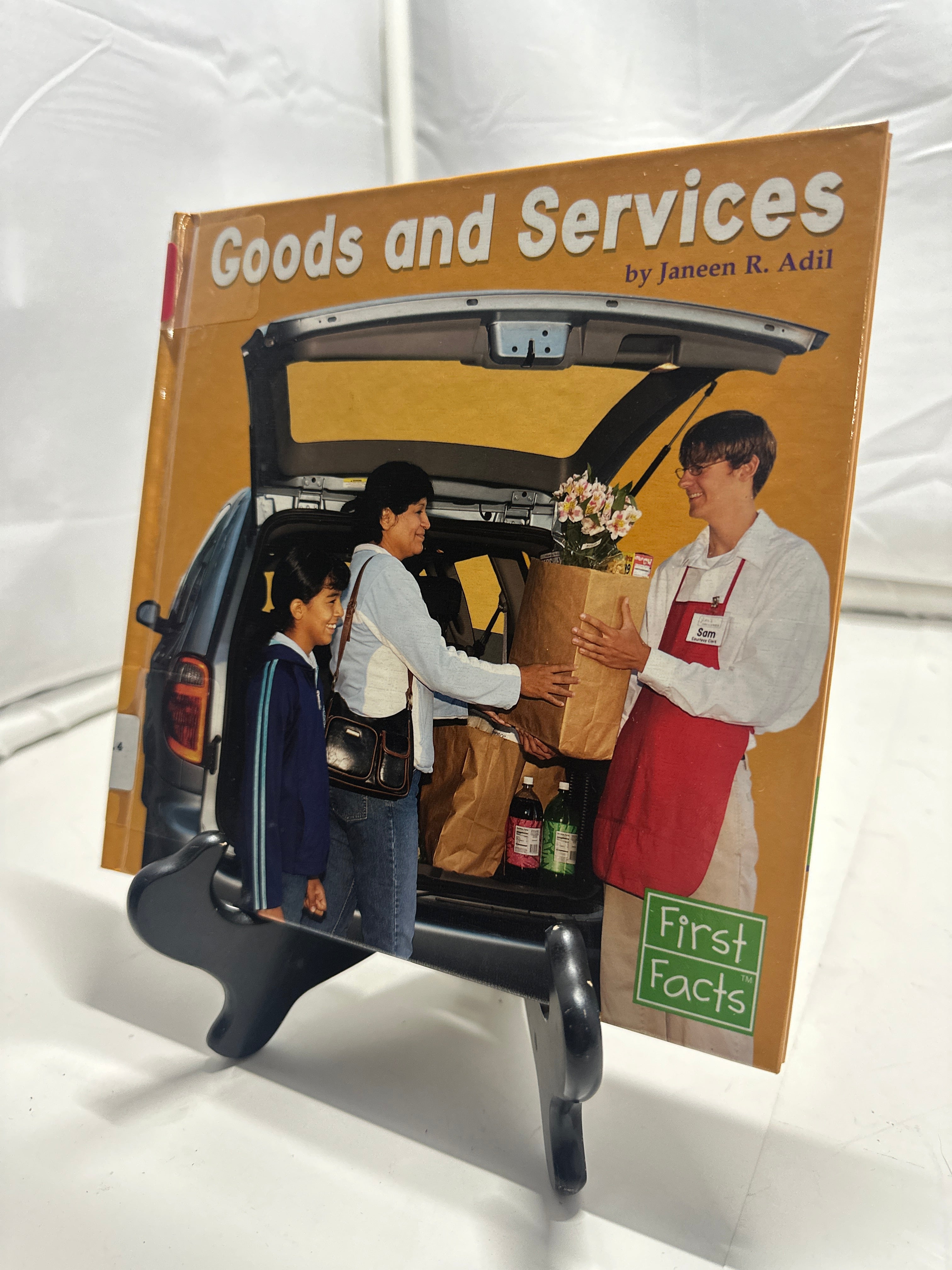 Goods and Services by Janeen R. Adil Hardcover
