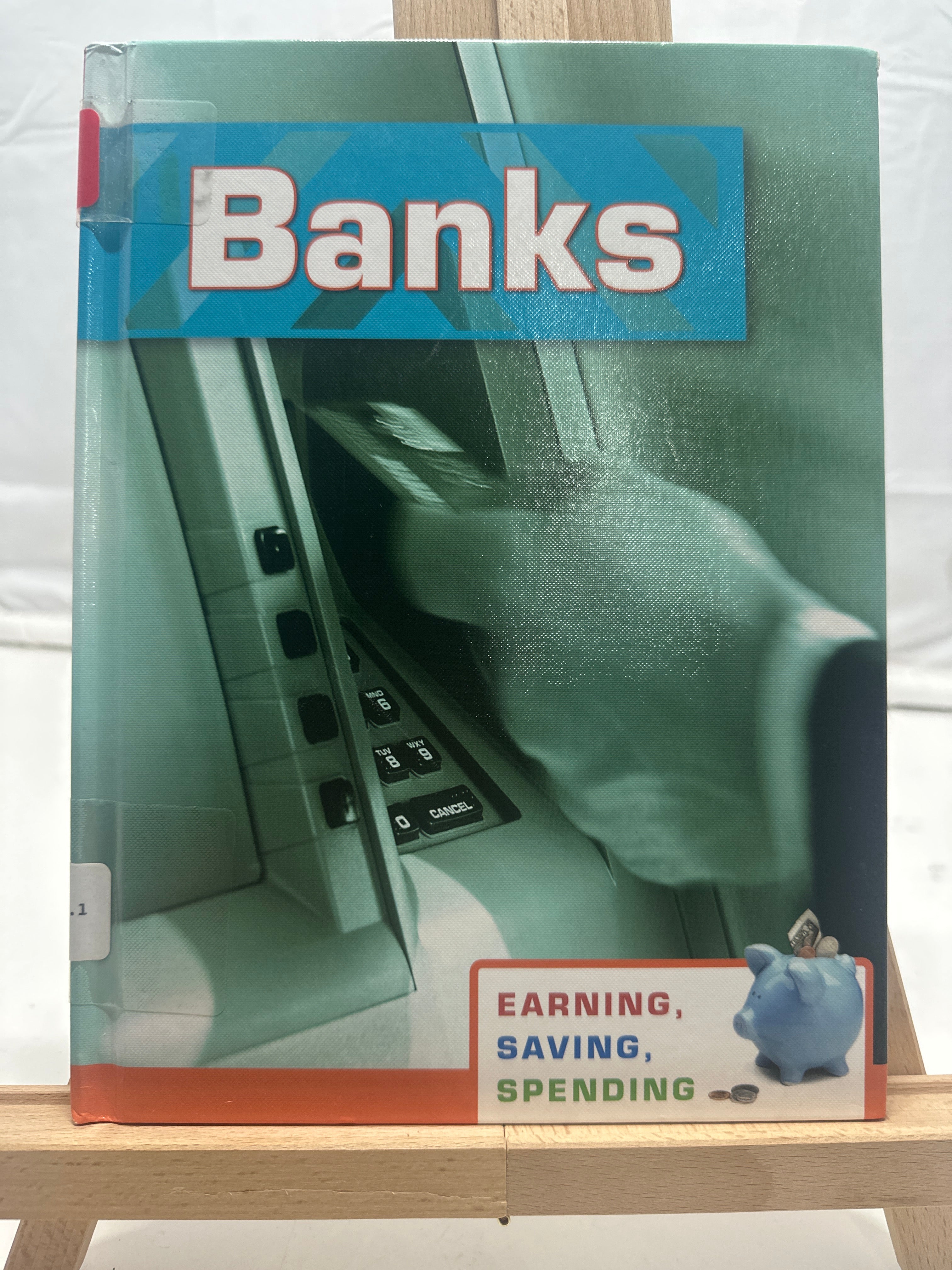 Banks (Earning, Saving, Spending) by Margaret Hall Hardcover