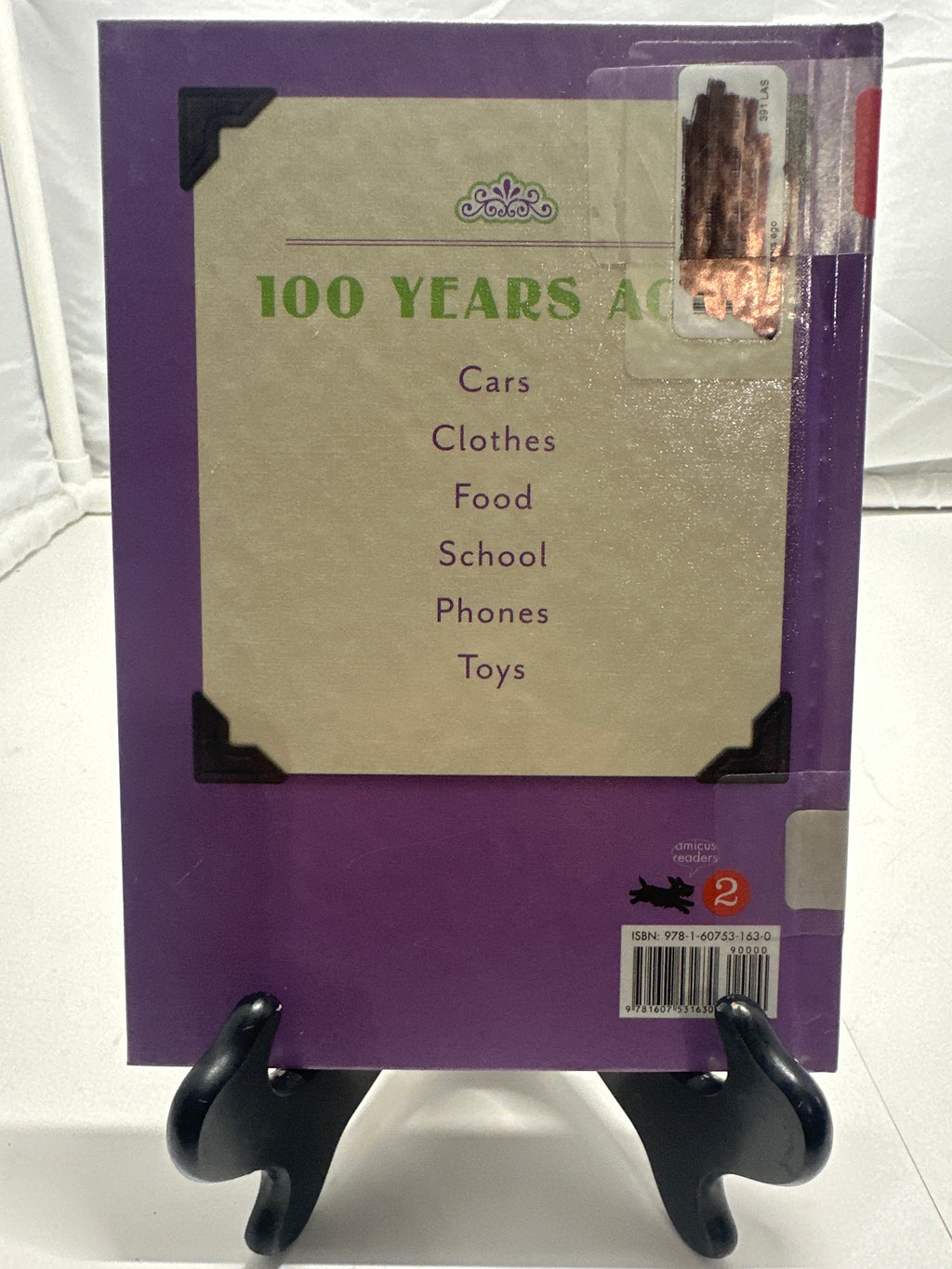 Clothes 100 years ago by Allison Lassieur Hardcover Children