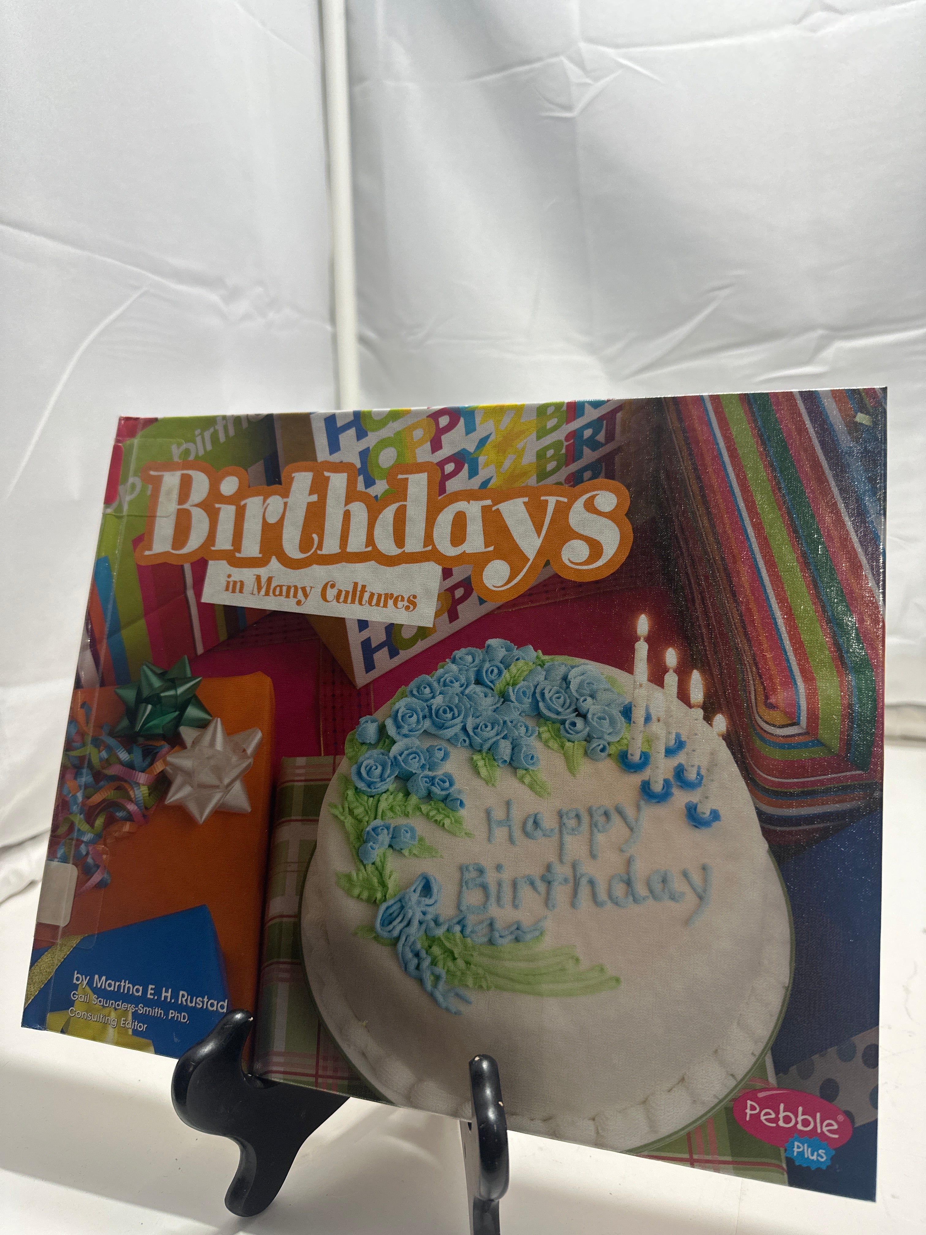 Birthdays in many cultures by Martha E. H. Rustad Hardcover