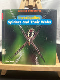 Investigating spiders and their webs by Ellen René Hardcover Children's Book