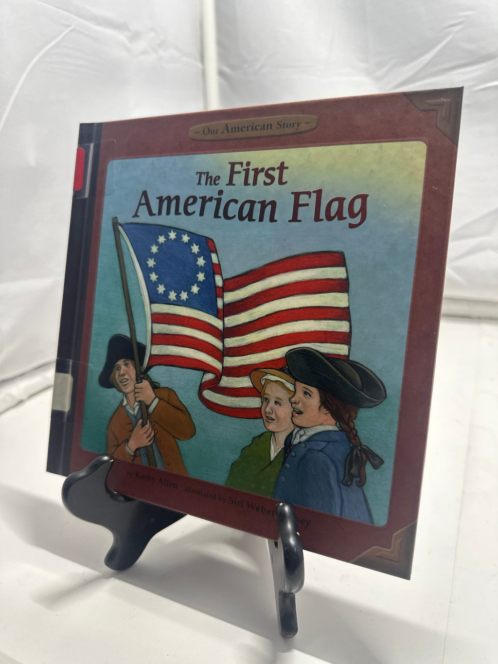 The first American flag by Kathy Allen Hardcover Children's Book
