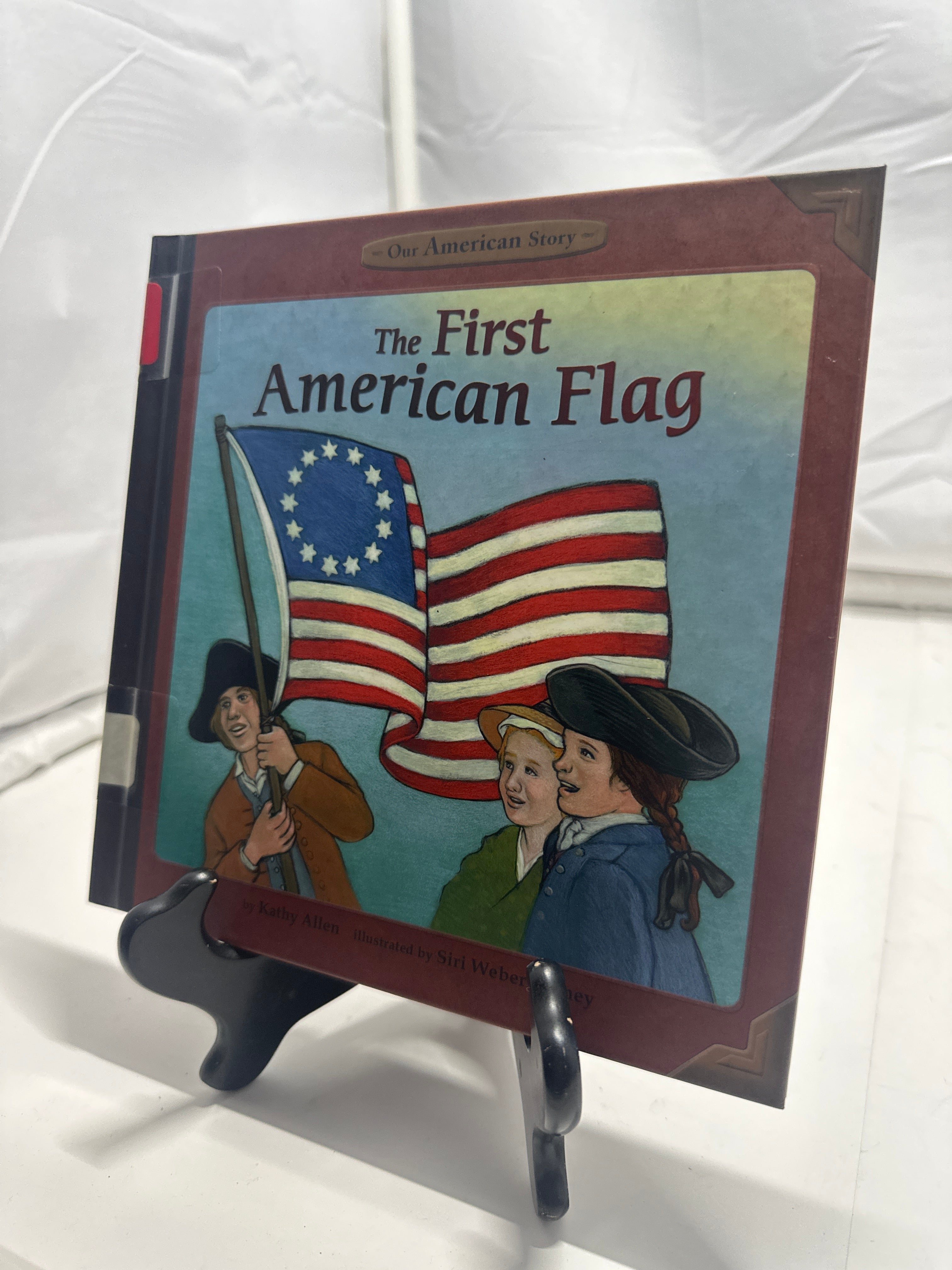 The first American flag by Kathy Allen Hardcover Children's Book