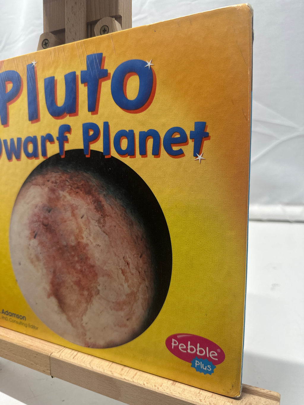 Pluto by Thomas K. Adamson Hardcover