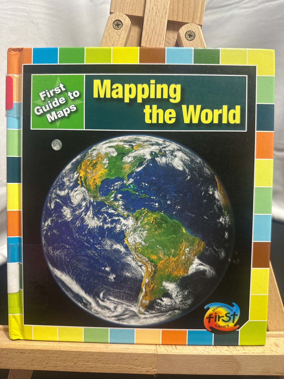 Mapping the world by Marta Segal Block Hardcover Children's Book