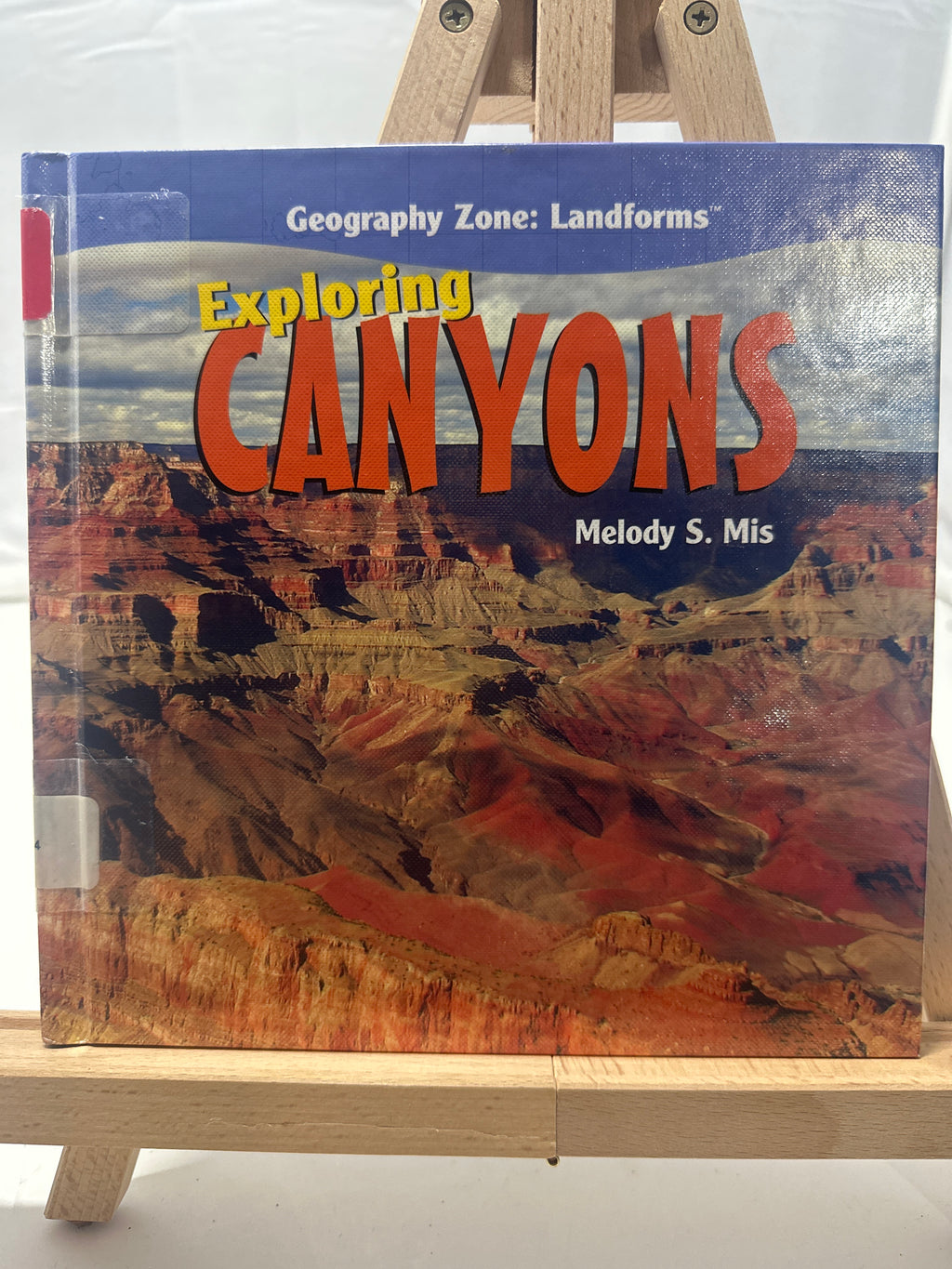 Exploring canyons by Melody S. Mis Hardcover Children's Book