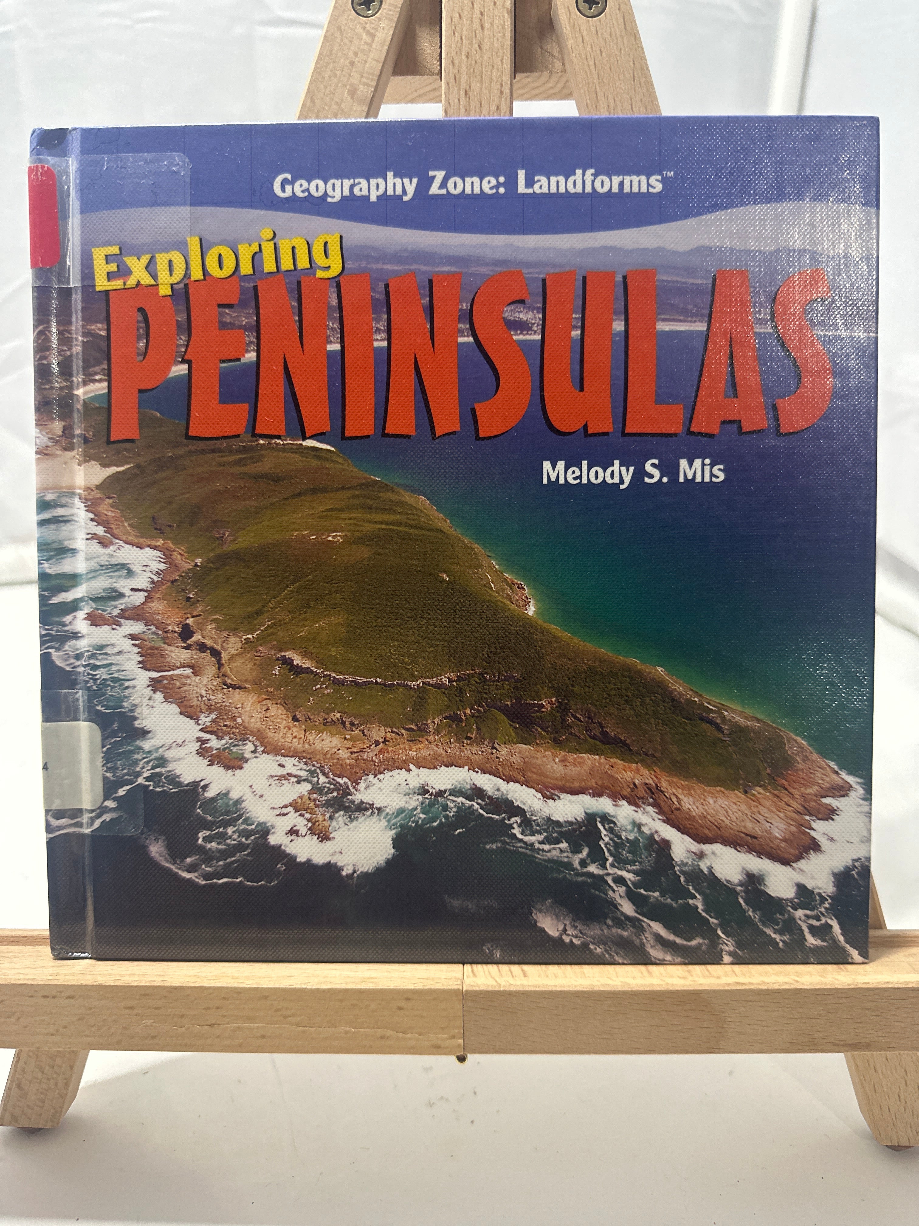 Exploring peninsulas by Melody S. Mis Hardcover Children's Book