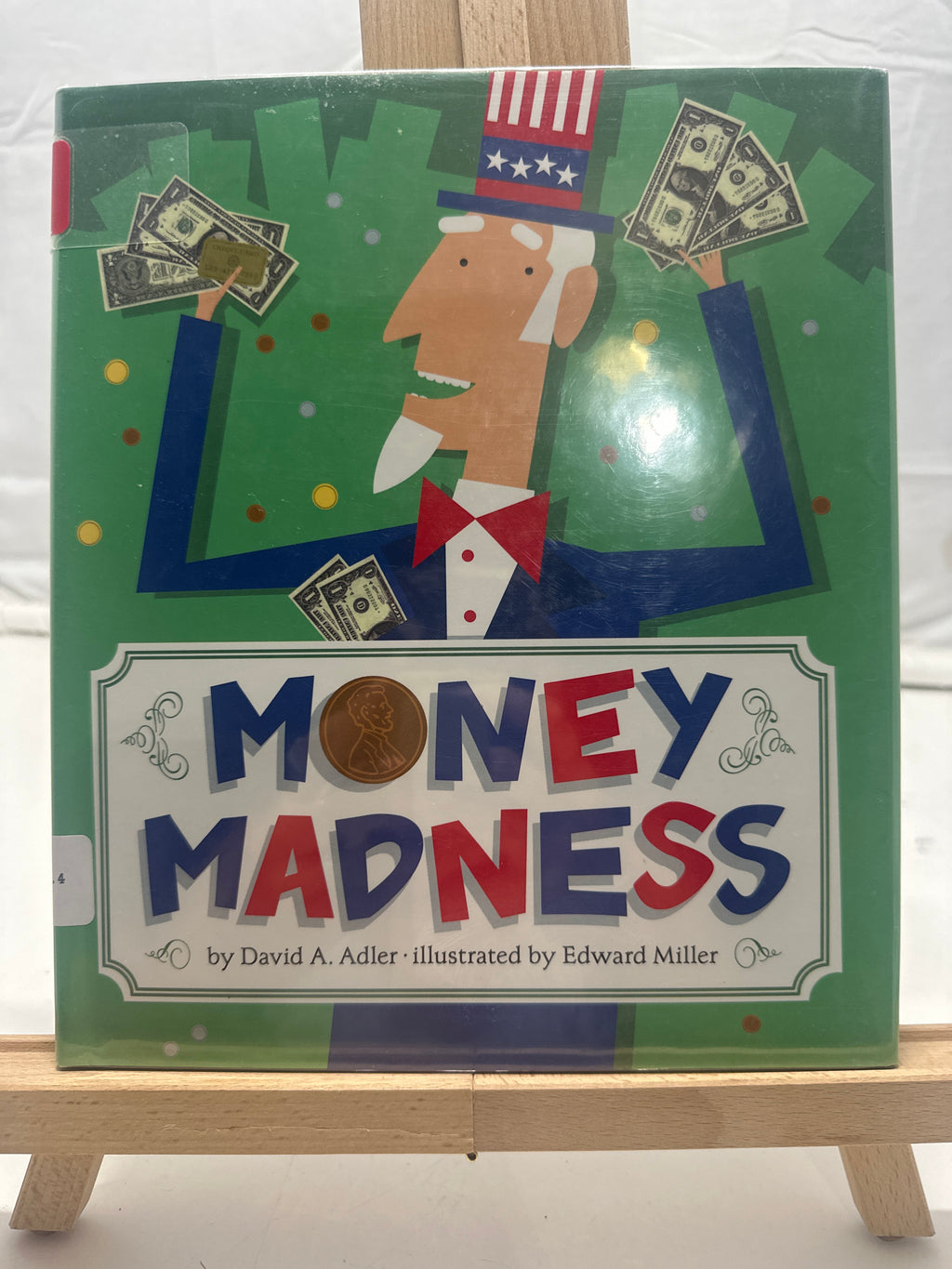 Money madness by David A. Adler Hardcover Children's Book