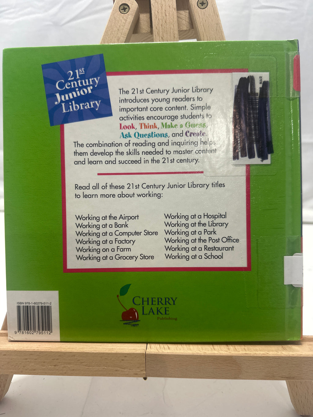 Working at the library by Katie Marsico Hardcover Children's Book